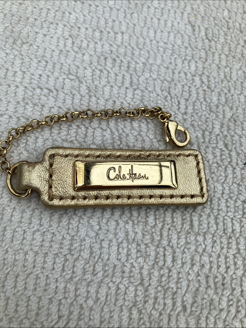 Gorgeous Metallic Gold Cole Haan Bag Charm or key chain